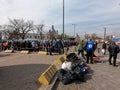 Refugees on the forecourt are waiting for their buses to European countries. People fleeing from the