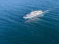 Refugees imigrants in the ferry boat ship aerial view in the sea concept d