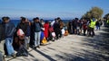 Refugees waiting for the bus to camp Royalty Free Stock Photo