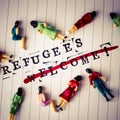 Refugees welcome strikethrough text on paper