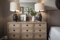 refurbished dresser with new hardware and decorative handles sits in upscale bedroom