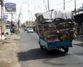 Refuse/Recycling truck carrying waste cardboard by road Royalty Free Stock Photo