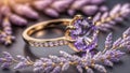 Regal Radiance: A Gorgeous Gold Ring with a Dazzling Purple Amethyst Stone Set Against a Sleek Black Background