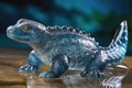 A regal water dinosaur gliding gracefully through the crystal blue waters its presence commanding attention.. AI
