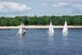 Regatta competition on lake river sailing yachts boats with white sails and gennaker Royalty Free Stock Photo