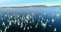 Regatta in Gelendzhik Bay. A lot of small one-and two-person yachts jostle in the Bay with a light wind. The view from