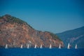 Regatta sailing boats in blue high sea Royalty Free Stock Photo