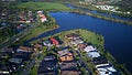 Regatta Waters On The lake and Parkland Gold Coast Grass play area House Estate next to Coomera River On The lake, Royalty Free Stock Photo