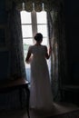 Regency woman in dark room Royalty Free Stock Photo