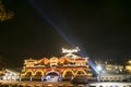 Regensburg, Bavaria, Germany, October 31, 2016, Illuminated Circus Krone Entrance and Tent at a foggy night