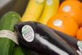 Regensburg, Germany - 03 05 2024: Close up of assortment of organic eggplants and zuchinis with REWE Bio stickers