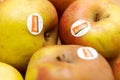 Regensburg, Germany - 01 15 2021: Detail of organic Boskoop apples with Demeter label lying on wooden table