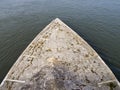 Seagulls resting on the cement of the water separator