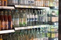 Regensburg, Germany - 2021 02 05: Shelf with different glass bottles of mineral water in german organic super market