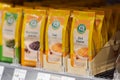 Regensburg, Germany - 2021 02 05: Shelf with various spices with powdered cinnamon of brand Lebensbaum in focus on display in