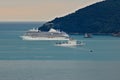 Regent Seven Seas Explorer cruise ship and the military ship Alliance