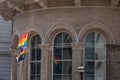 Close up of rainbow LGBT flag flying at the Gay Pride Parade in London 2018. Photographed outside The Langham Hotel