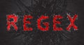 Regex of red polygons inscription from programming area on black background. Digital regular expressions are patterns used to Royalty Free Stock Photo