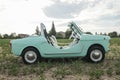 Reggio Emilia, Italy : 2021-08-10 Autobianchi Bianchina Spiaggina beautiful restored turquoise vintage car