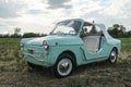 Reggio Emilia, Italy : 2021-08-10 Autobianchi Bianchina Spiaggina beautiful restored turquoise vintage car