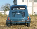 Reggio Emilia Italy : 2023 01 08 example of Vintage old car Fiat 750 in sugar paper blue color on a sunny day Royalty Free Stock Photo