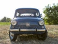 Reggio Emilia Italy : 2023 01 08 example of Vintage old car Fiat 750 in sugar paper blue color on a sunny day Royalty Free Stock Photo