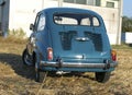 Reggio Emilia Italy : 2023 01 08 example of Vintage old car Fiat 750 in sugar paper blue color on a sunny day Royalty Free Stock Photo