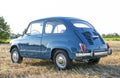 Reggio Emilia Italy : 2023 01 08 example of Vintage old car Fiat 750 in sugar paper blue color on a sunny day Royalty Free Stock Photo