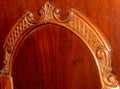 ornamental engraving on an old wooden cabinet