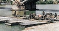 Regiment of pontoniers and the specialists of engineers of the Spanish Army mounting a boat bridge