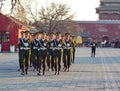 Regimented soldiers march inside the Forbidden City, Beijing, China