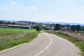 country road in Northern France leading into village Basse-Rentgen Royalty Free Stock Photo