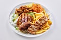 Regional Greek mixed grill with chips and pilaf Royalty Free Stock Photo