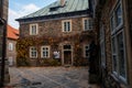 Regional Museum with ivy-covered wall, DvorakÃÂ´s Museum of Prehistory or formerly parish school near Gothic Cathedral, Medieval