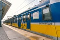 Regional new blue yellow train arriving to gdansk glowny railway station in Poland, Gdansk February 9, 2020. SKM regional railway Royalty Free Stock Photo