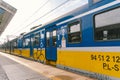 Regional new blue yellow train arriving to gdansk glowny railway station in Poland, Gdansk February 9, 2020. SKM regional railway Royalty Free Stock Photo