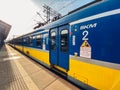 Regional new blue yellow train arriving to gdansk glowny railway station in Poland, Gdansk February 9, 2020. SKM regional railway Royalty Free Stock Photo