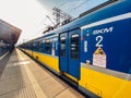 Regional new blue yellow train arriving to gdansk glowny railway station in Poland, Gdansk February 9, 2020. SKM regional railway Royalty Free Stock Photo