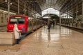 Regional red train at Rossio Railway Station in Lisbon