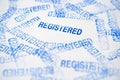 REGISTERED blue rubber stamp on a white background Royalty Free Stock Photo