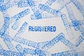 REGISTERED blue rubber stamp on a white background Royalty Free Stock Photo