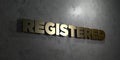 Registered - Gold text on black background - 3D rendered royalty free stock picture