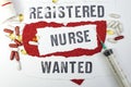 Registered Nurse wanted written with stamp letters