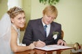 Registration of marriage. Happy newlyweds.