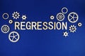 Regression alphabet letters with gears element on navy blue background Royalty Free Stock Photo
