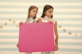 Regret to inform you. Girls hold advertisement poster copy space. Children hold advertising banner. Sad kids with blank Royalty Free Stock Photo