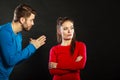 Regretful man husband apologizing upset woman wife