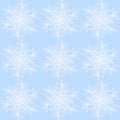 Regular abstract snowflakes pattern white on pastel blue Royalty Free Stock Photo