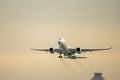 regular airplane folding the landing gear after climbing Royalty Free Stock Photo