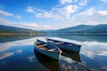 regular boats anchored in a serene lake